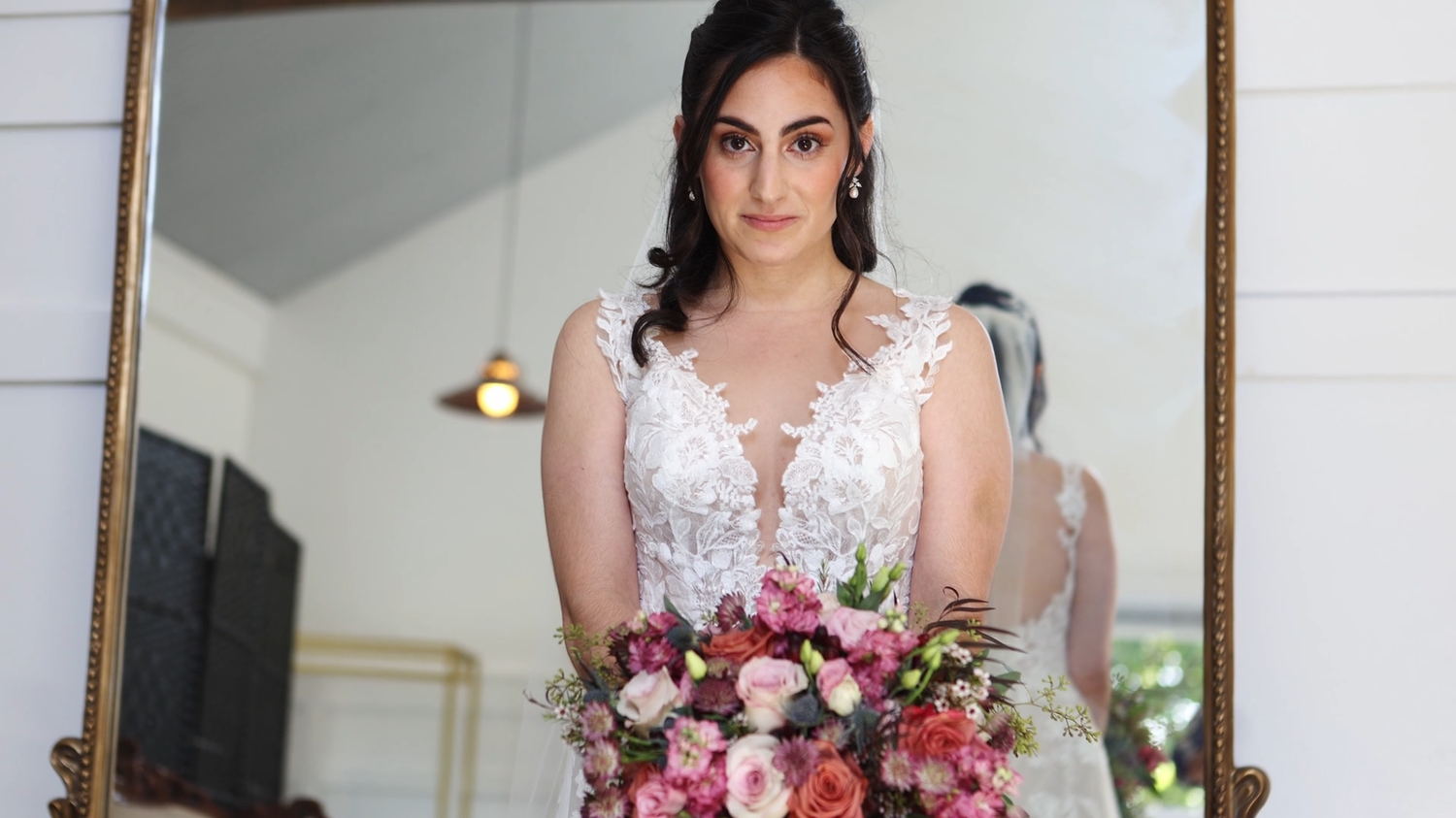 A bride with her bouquet before the ceremony